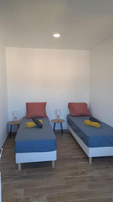 Posteľ alebo postele v izbe v ubytovaní Appartement lumineux et central