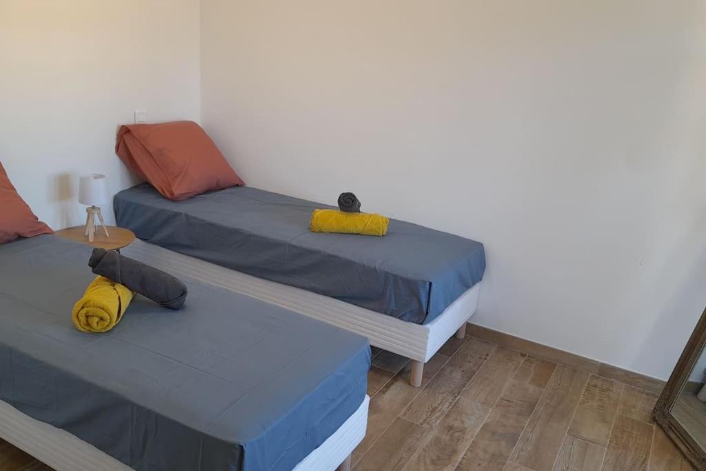 Posteľ alebo postele v izbe v ubytovaní Appartement lumineux et central