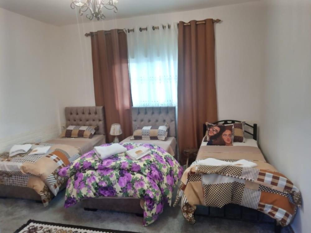 Postel nebo postele na pokoji v ubytování taila hostel