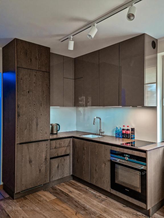 Kuchyň nebo kuchyňský kout v ubytování Apartament VIP PROMENADA