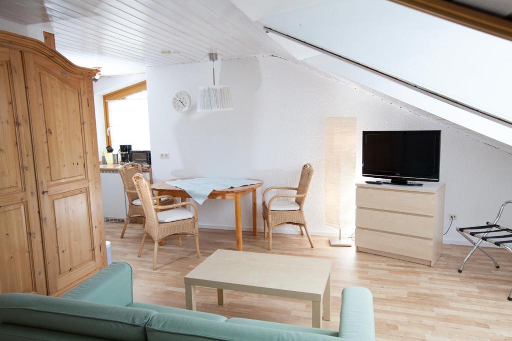 TV a/nebo společenská místnost v ubytování Gästehaus Schechter