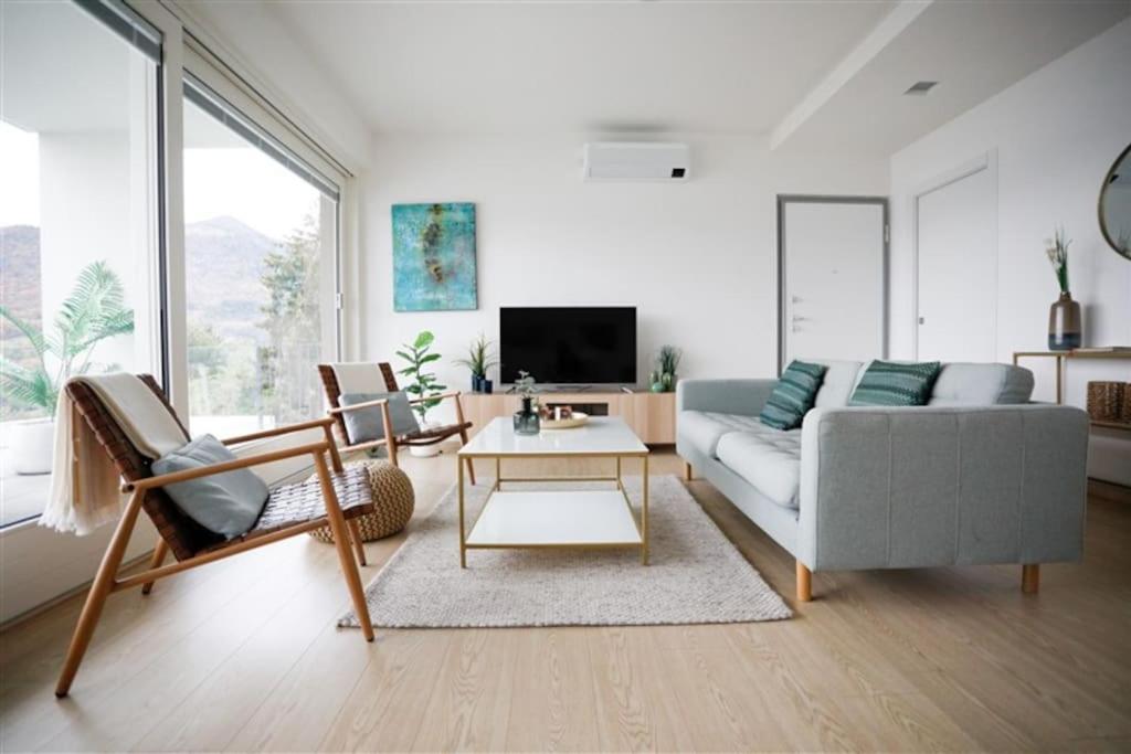 A television and/or entertainment centre at IseoLakeRental - Trivia Bellavista