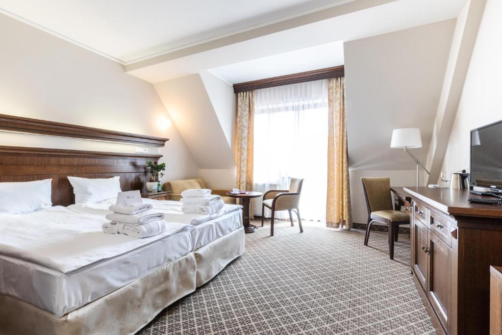 Postel nebo postele na pokoji v ubytování Hotel Crocus