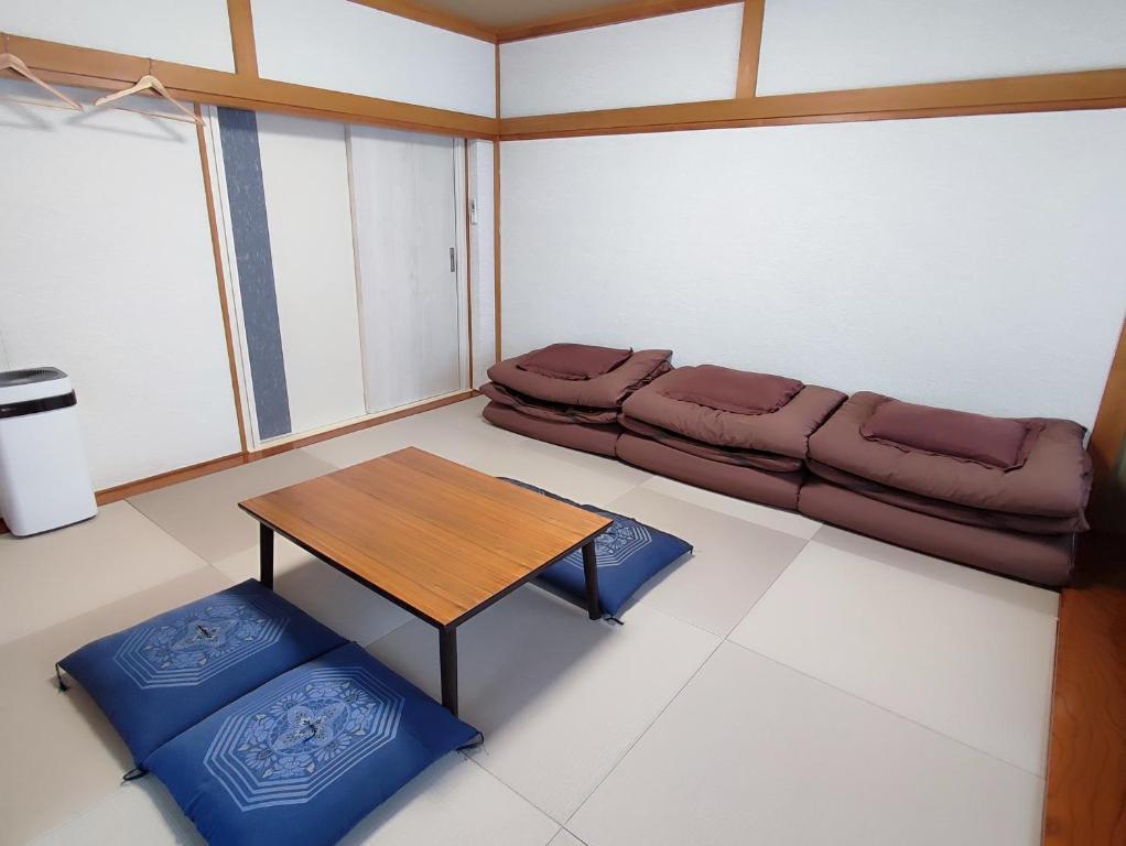 Posezení v ubytování Fuji Guest House Ao