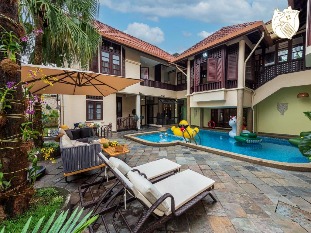 an image of a house with a swimming pool at 6BR San He Yuan RIAD Private Pool Villa KLCC View by Verano in Kuala Lumpur