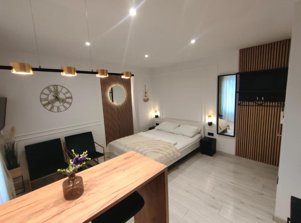 Posteľ alebo postele v izbe v ubytovaní Alegra Apartments Center