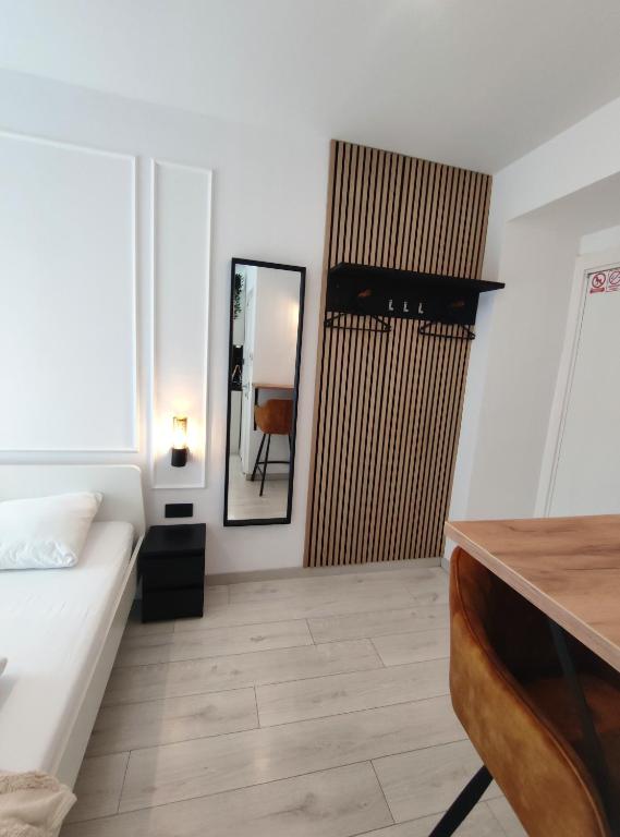 Posteľ alebo postele v izbe v ubytovaní Alegra Apartments Center
