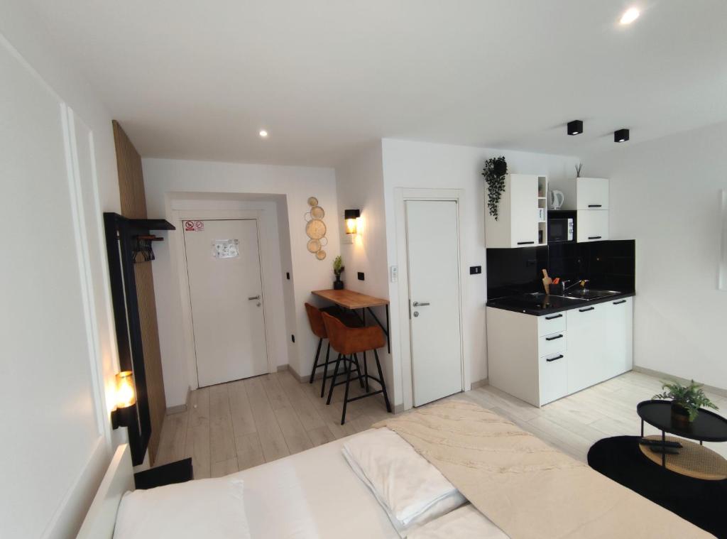 Kuchyňa alebo kuchynka v ubytovaní Alegra Apartments Center