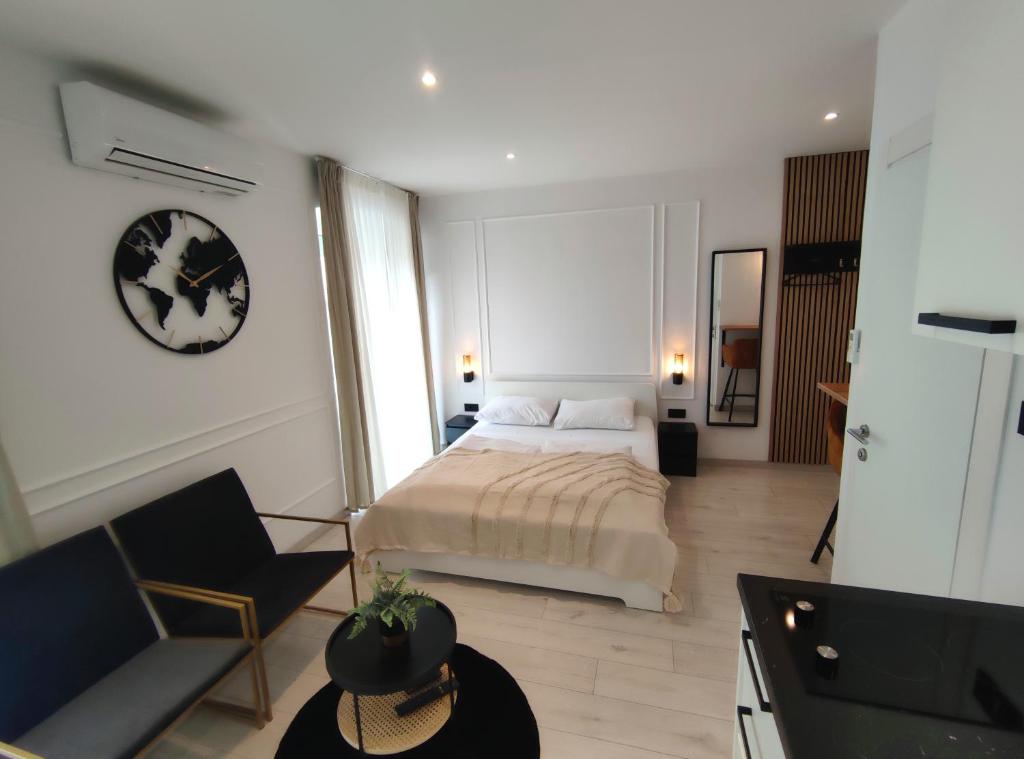 Posteľ alebo postele v izbe v ubytovaní Alegra Apartments Center