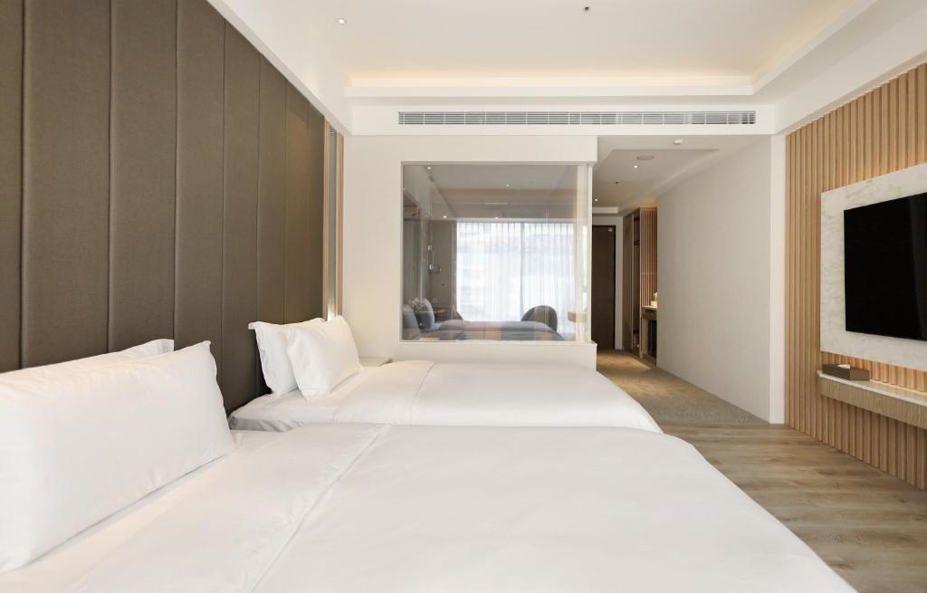 TV a/nebo společenská místnost v ubytování Gamalan Star Hotel