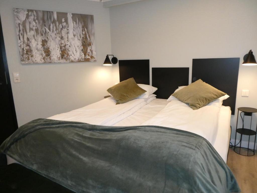 Postel nebo postele na pokoji v ubytování Northberg Apartments