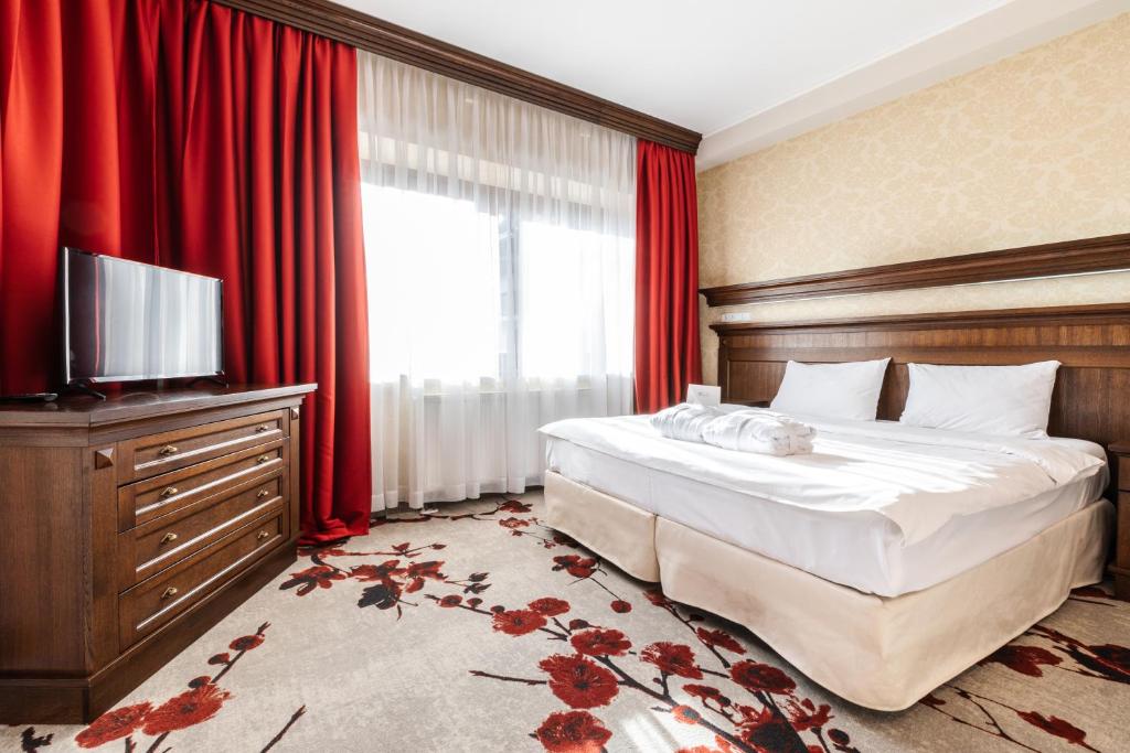 TV a/nebo společenská místnost v ubytování Hotel Crocus