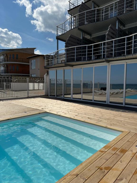 Bazén v ubytování Apart-Hotel Poseidon nebo v jeho okolí