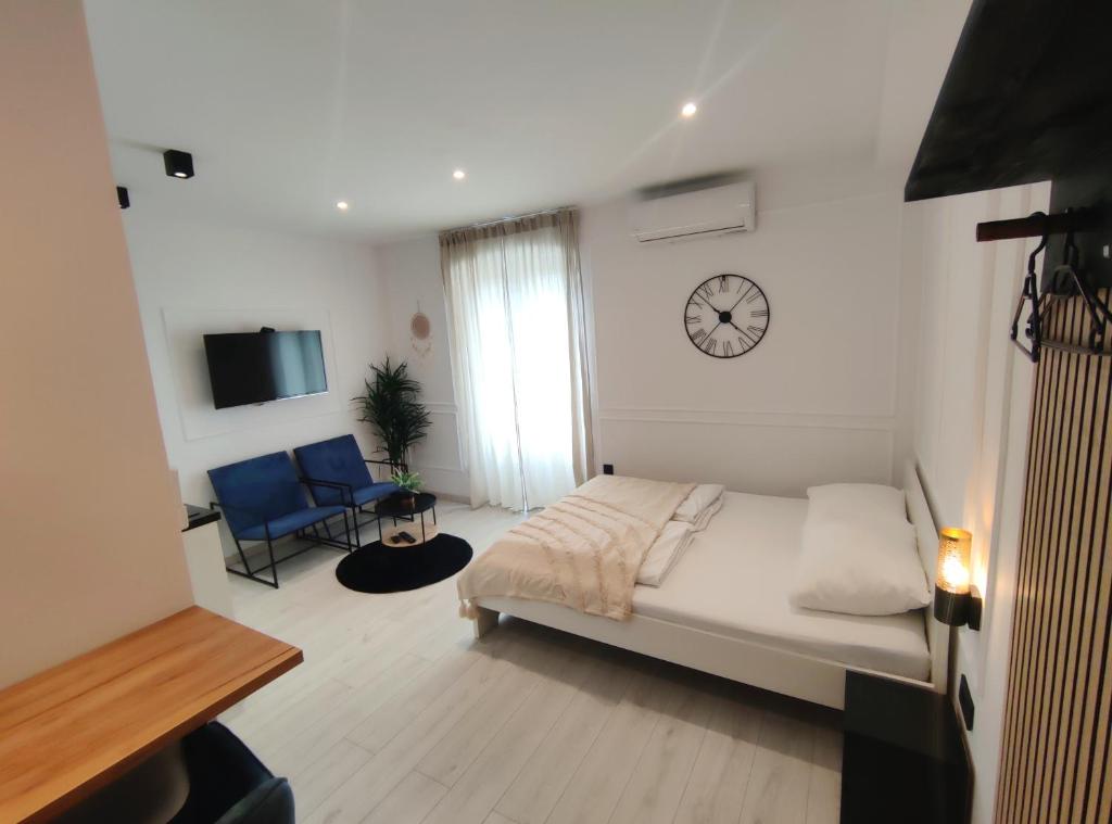 Posteľ alebo postele v izbe v ubytovaní Alegra Apartments Center