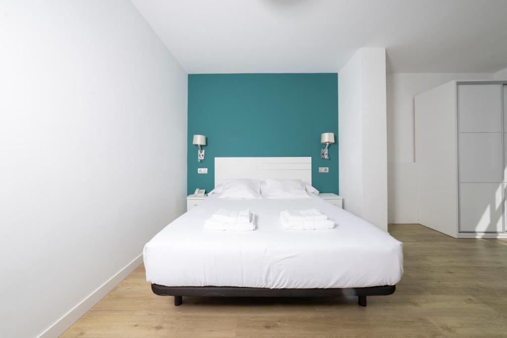 Cama o camas de una habitación en Hotel Mar de Fisterra