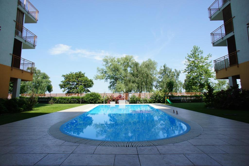 The swimming pool at or close to Viktória Beach Apartman Gold 1. Siófok
