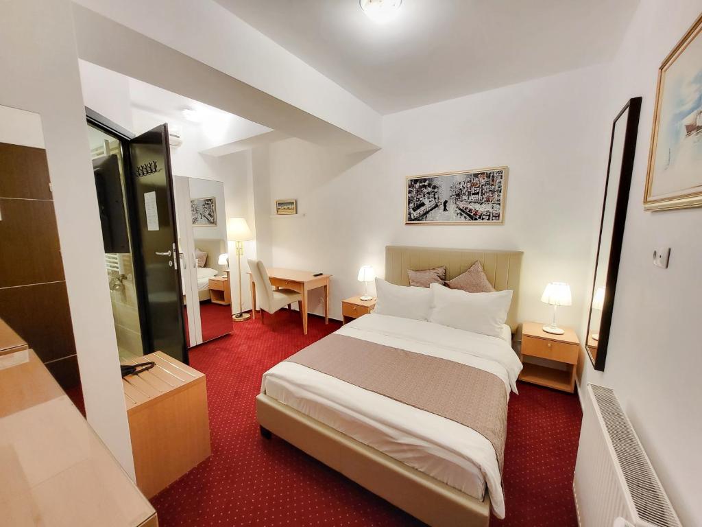 Postel nebo postele na pokoji v ubytování Bucur Accommodation