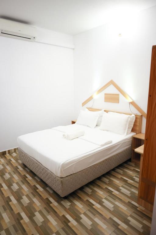 Postel nebo postele na pokoji v ubytování Golhaaviewinn