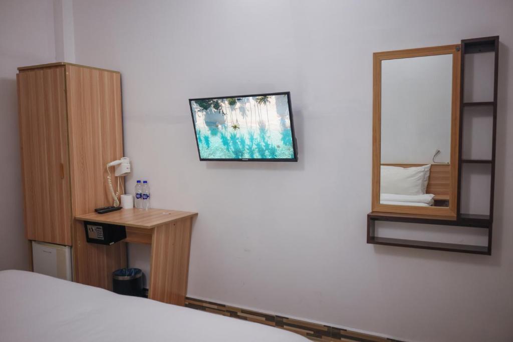 TV a/nebo společenská místnost v ubytování Golhaaviewinn