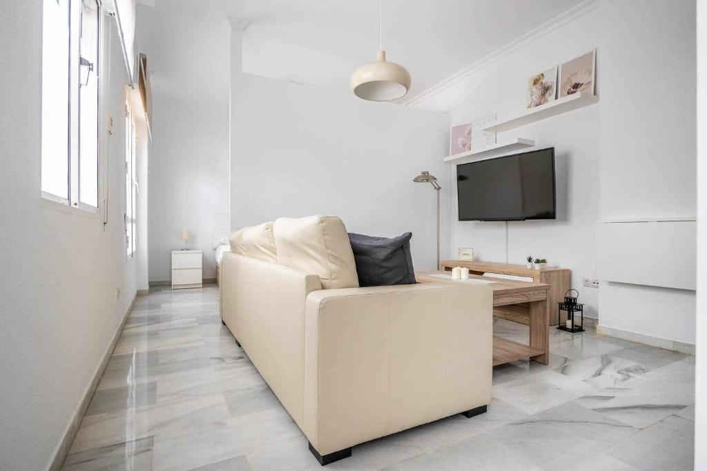 Telewizja i/lub zestaw kina domowego w obiekcie COMFY AWAY - Apartamento Deluxe Centro Histórico