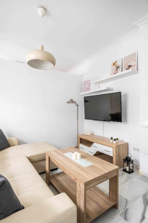 Telewizja i/lub zestaw kina domowego w obiekcie COMFY AWAY - Apartamento Deluxe Centro Histórico