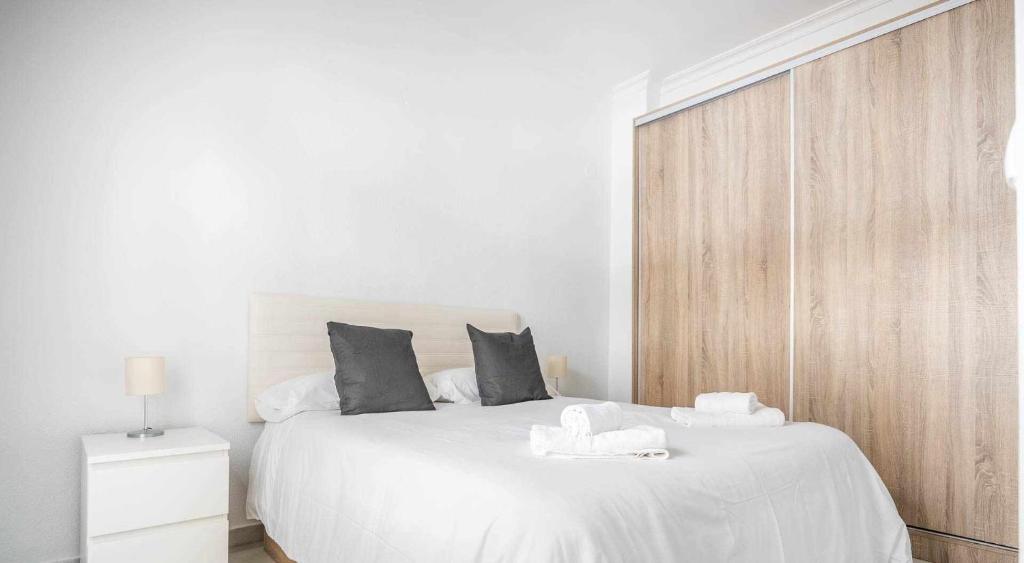 Łóżko lub łóżka w pokoju w obiekcie COMFY AWAY - Apartamento Deluxe Centro Histórico