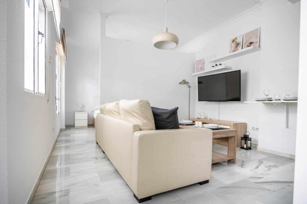 Telewizja i/lub zestaw kina domowego w obiekcie COMFY AWAY - Apartamento Deluxe Centro Histórico