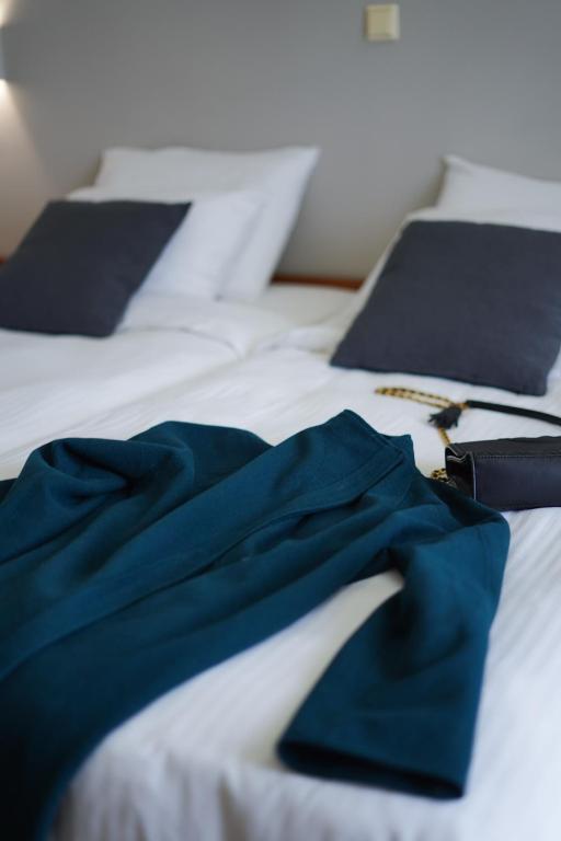 Postel nebo postele na pokoji v ubytování Fthia Hotel
