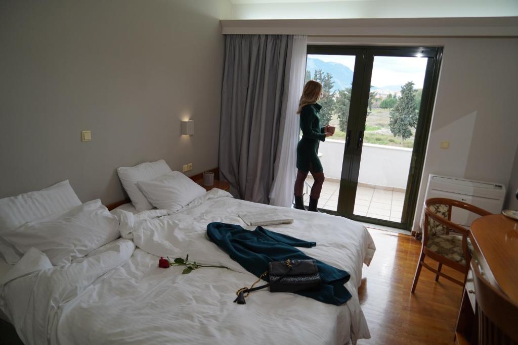 Postel nebo postele na pokoji v ubytování Fthia Hotel