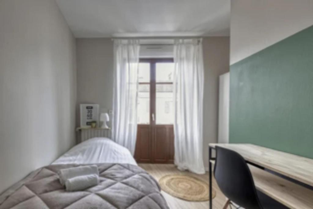 Posteľ alebo postele v izbe v ubytovaní Le Commingeois - DUPLEX - 3 chambres - 110 m