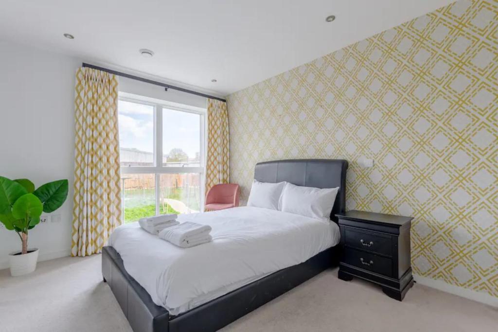 Voodi või voodid majutusasutuse Spacious & Family Friendly 3BD House - Stratford toas
