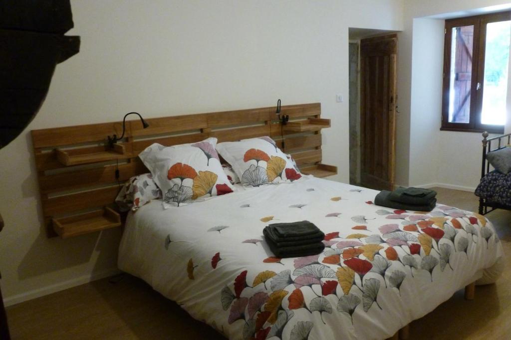 Posteľ alebo postele v izbe v ubytovaní Pechingorp Chambres d'hôtes
