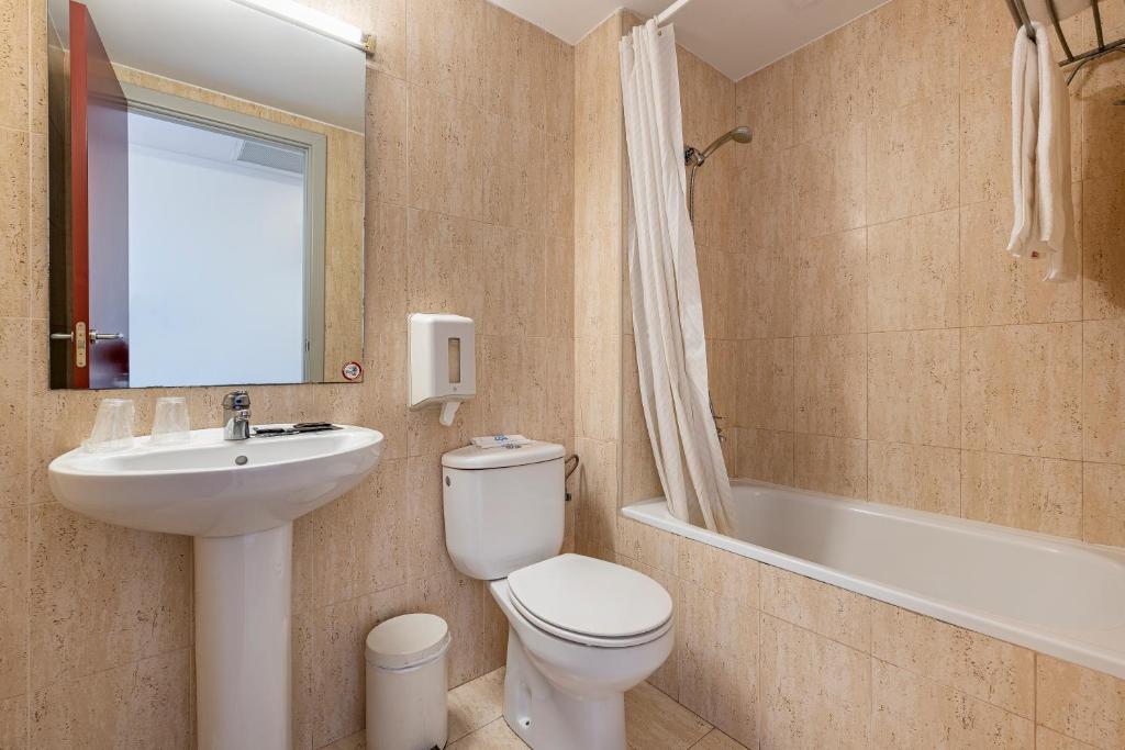 Koupelna v ubytování Hotel Basic