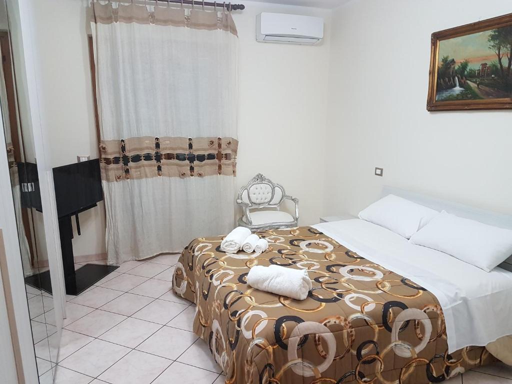 Posteľ alebo postele v izbe v ubytovaní Just Pompei Holiday House
