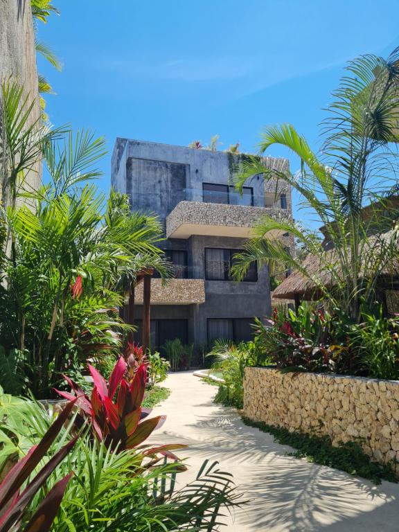 Xentum Apartments Complex in Tulum Pool Garden By Yeah, Mexico