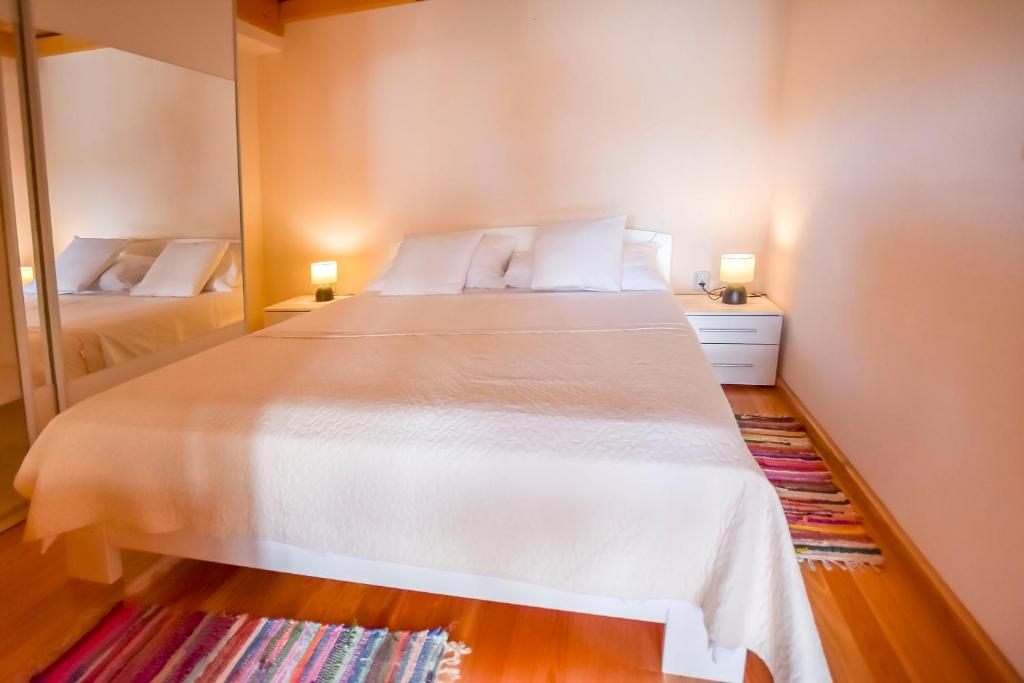 Postel nebo postele na pokoji v ubytování Villa Green Oasis