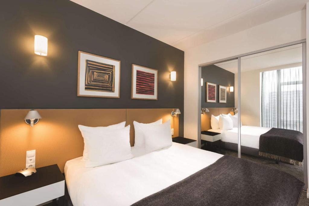Postel nebo postele na pokoji v ubytování Adina Apartment Hotel Copenhagen
