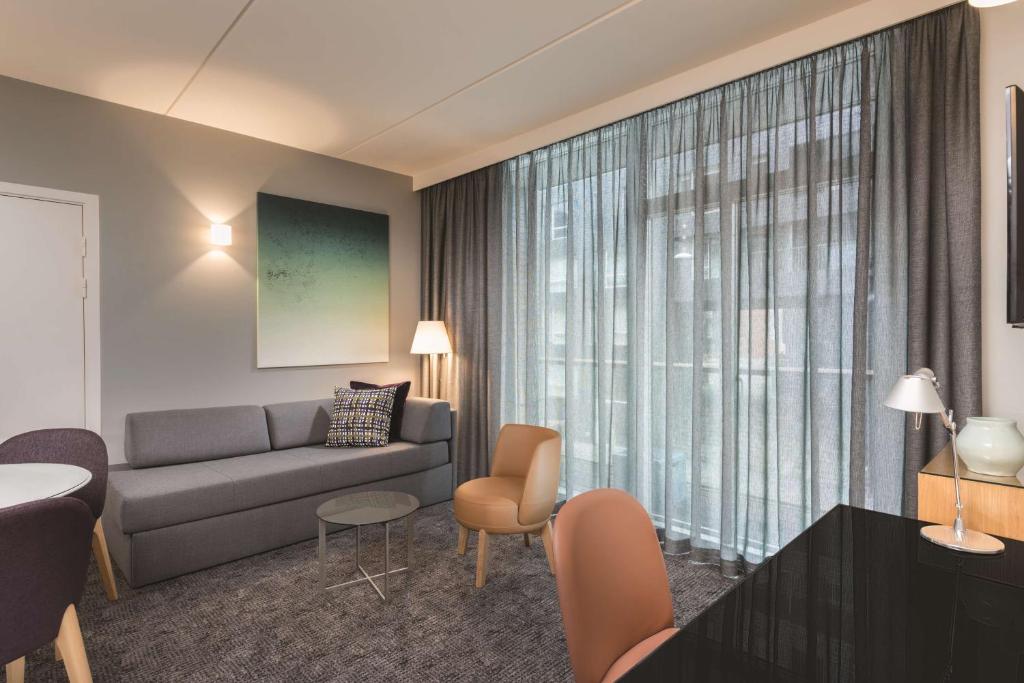 Posezení v ubytování Adina Apartment Hotel Copenhagen