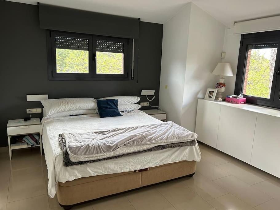 Posteľ alebo postele v izbe v ubytovaní Casa en Sant Cugat