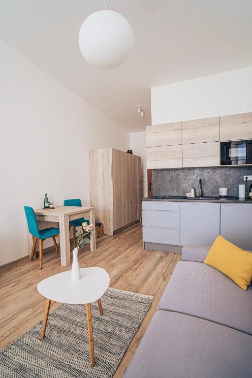 A kitchen or kitchenette at Apartmány Tatry