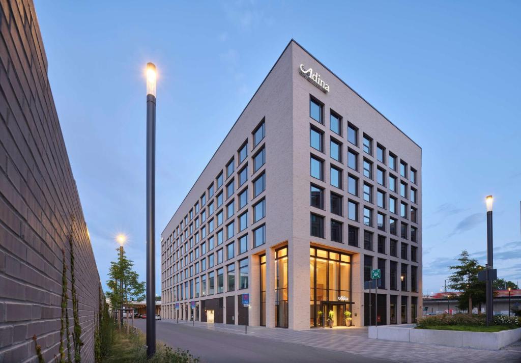 a rendering of a hotel building on a street at Adina Apartment Hotel Cologne in Cologne
