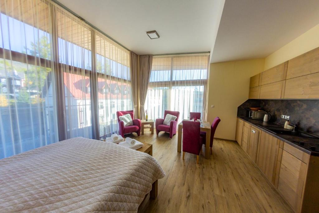 A kitchen or kitchenette at Apartmány Tatry