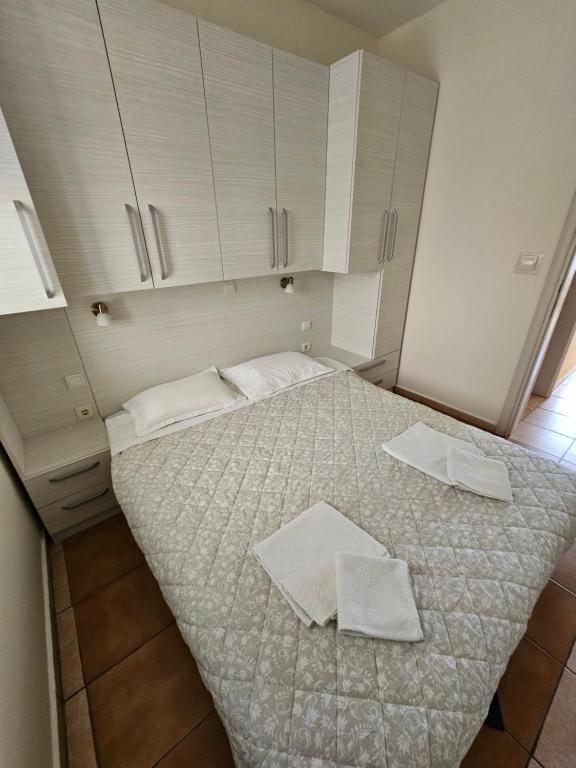 Postel nebo postele na pokoji v ubytování Lanterna Apartments