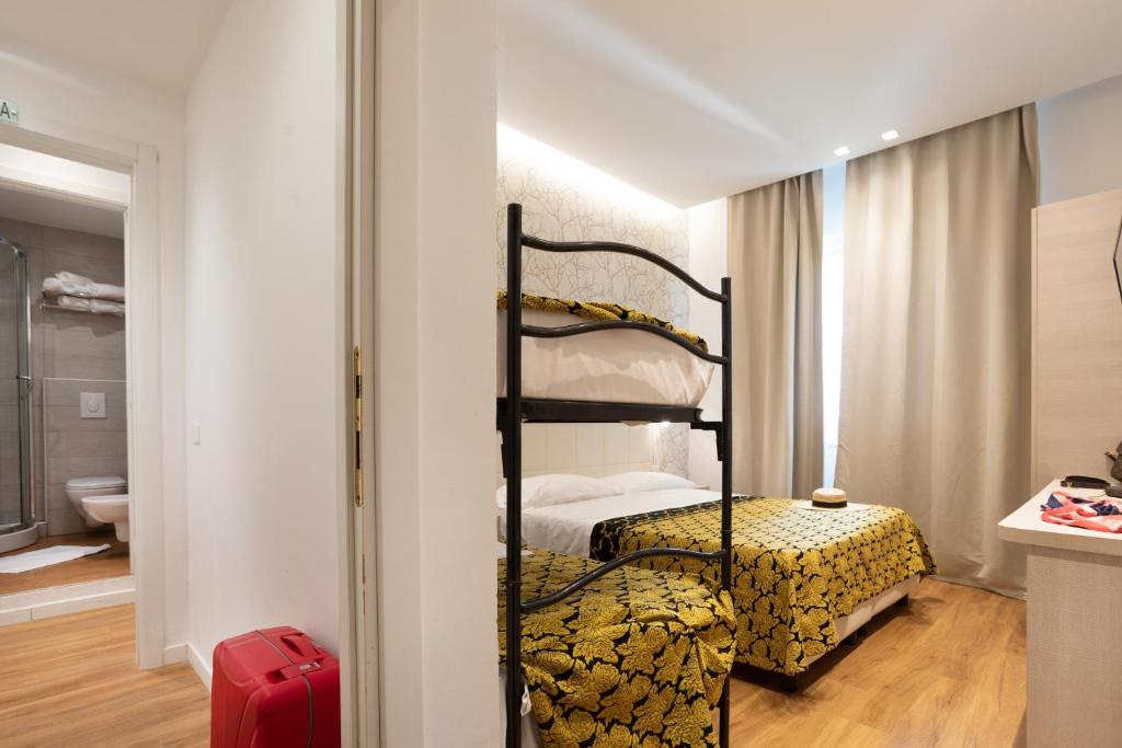 Postel nebo postele na pokoji v ubytování Hb Hotels Orchidea Blu