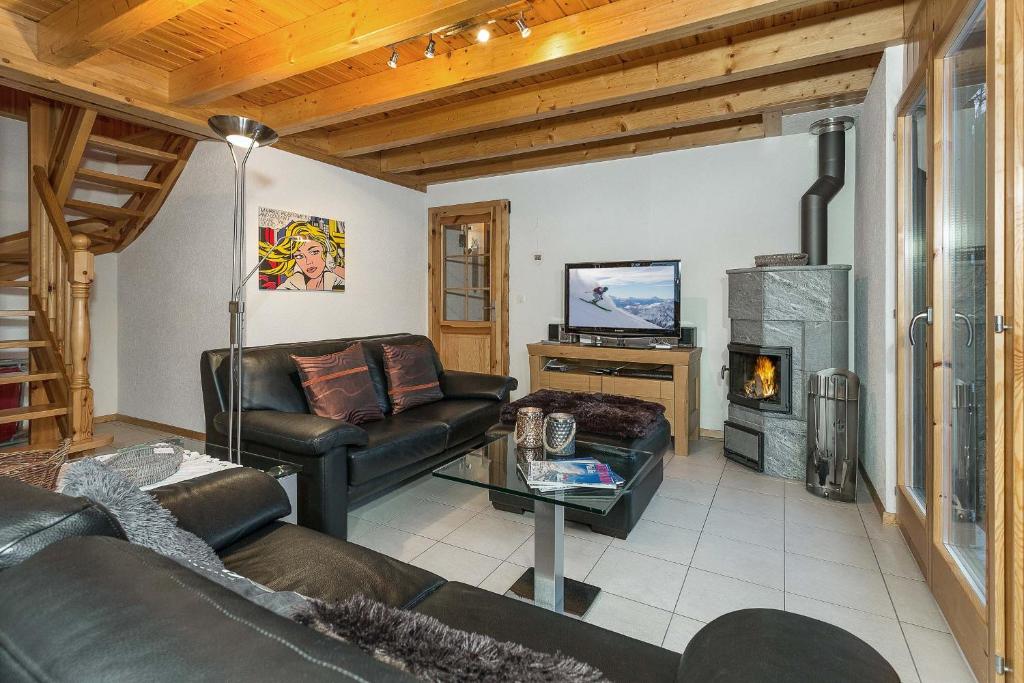 TV a/nebo společenská místnost v ubytování Chalet Colonia