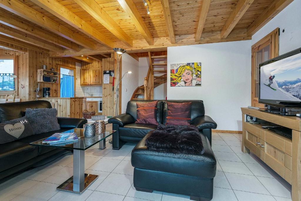 TV a/nebo společenská místnost v ubytování Chalet Colonia