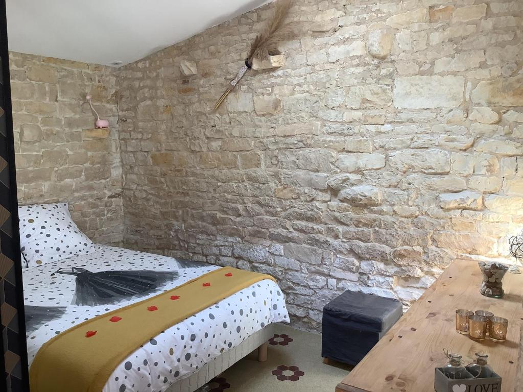 Łóżko lub łóżka w pokoju w obiekcie Cottage L’O RIO