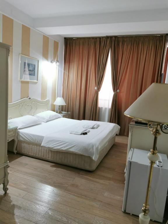 Postel nebo postele na pokoji v ubytování Nevis Fundeni