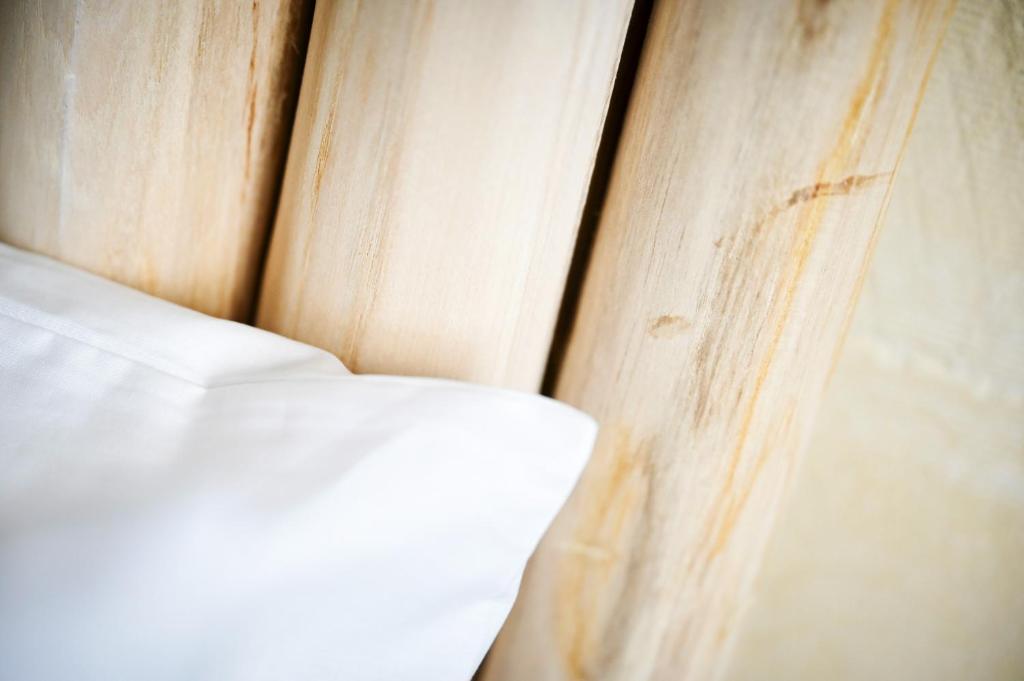 Postel nebo postele na pokoji v ubytování Ogygia Suites Gozo