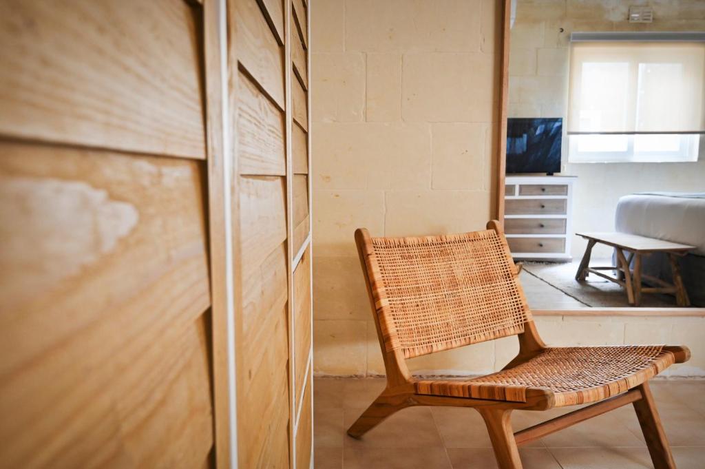 TV a/nebo společenská místnost v ubytování Ogygia Suites Gozo